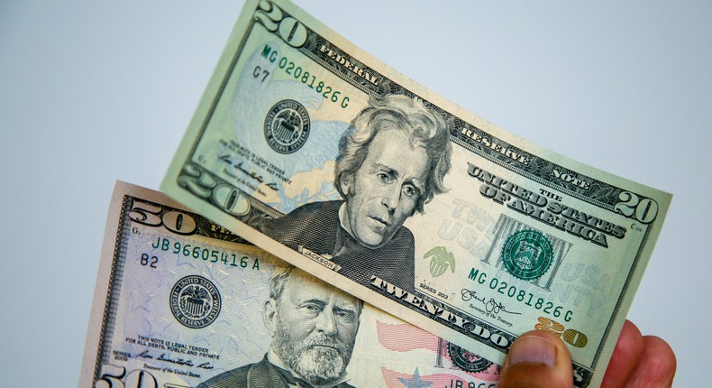 The dollar will likely continue to be strong with a Federal Reserve pivot off the table, UBS said.SOPA images