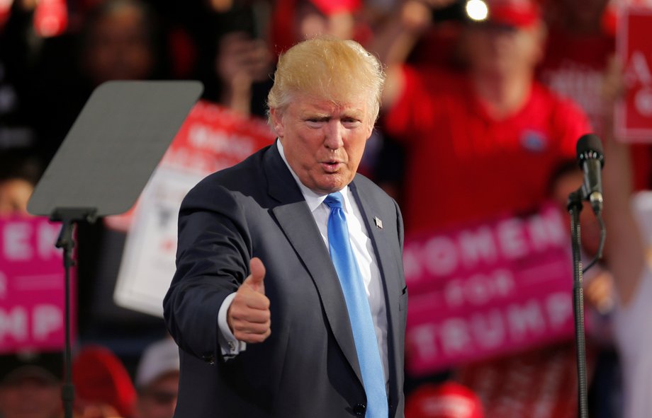 Donald Trump gives a thumbs up to the crowd after speaking at a campaign rally in Raleigh, North Carolina, November 7, 2016.