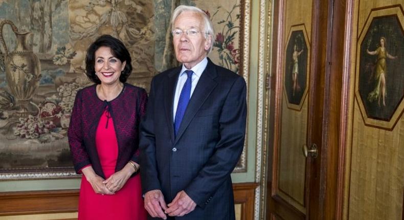 Retired Dutch politician Herman Tjeenk Willink (R) meets Chairman of the senate Khadija Arib in The Hague, on May 30, 2017, after he was appointed as the moderator for a new round of negotiations to form a coalition government