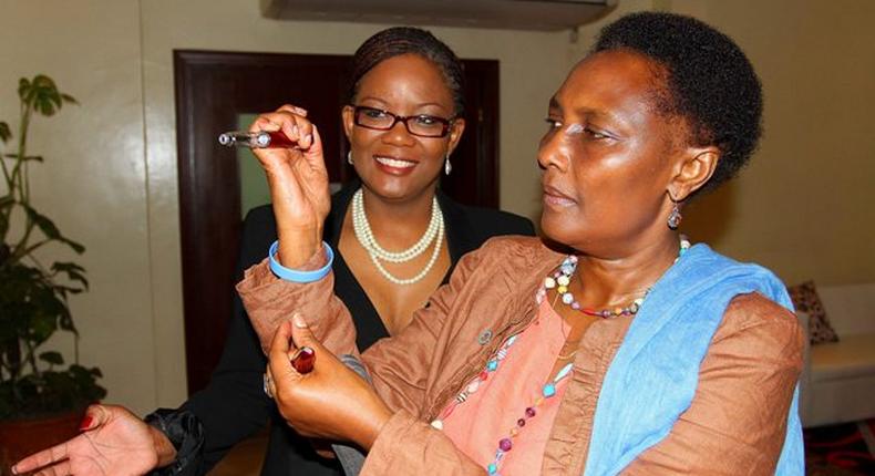 Dr Eva Njenga  (R) with another doctor at a past event.