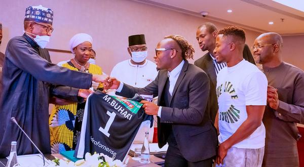 President Muhammadu Buhari gifted jersey in Portugal