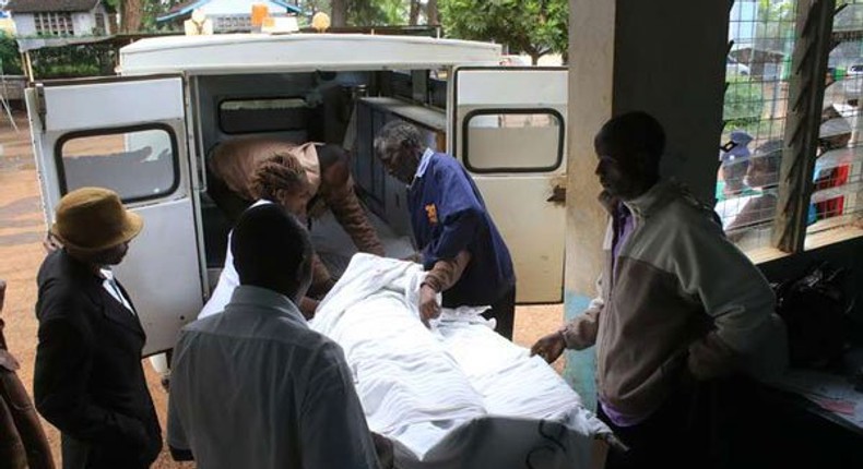 An accident victim, is carried into an ambulance at Karatina sub county hospital after hours of waiting without assistance on December 5, 2016 as doctors went on strike.