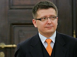 Prezydencki minister podróżował z handlarzem bronią