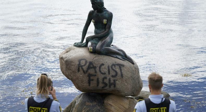 The iconic statue of the Little Mermaid in Cophengan vandalised with a phrase which has left police puzzling over what it means and who might have written it