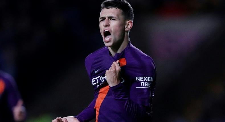 Manchester City's English midfielder Phil Foden celebrates scoring against Oxford