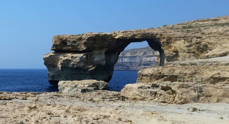 A picture taken on July 21, 2015 in Malta shows the Azure Window, a limestone arch on Gozo island