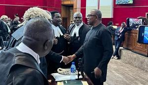Peter Obi saying hello to his legal team