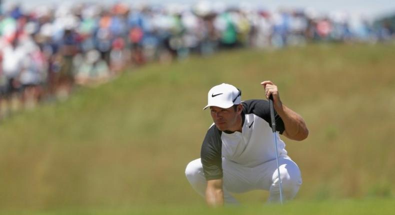 Paul Casey of England lines up a putt on the ninth green during the second round of the 2017 US Open at Erin Hills on June 16, 2017 in Hartford, Wisconsin