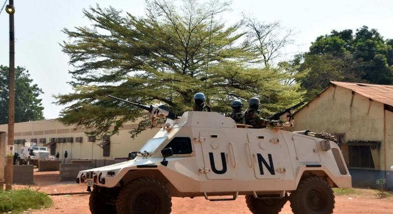 Peacekeepers from the MINUSCA mission of the United Nations patrol on January 2, 2016 in Bangui