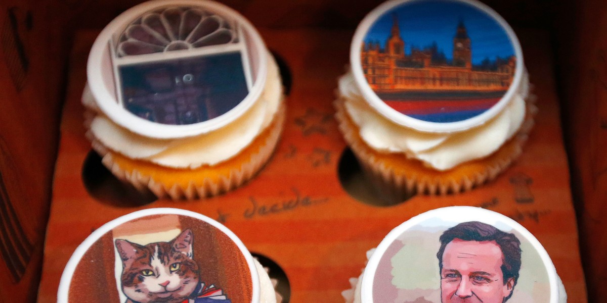 Cupcakes with images of Britain's Prime Minister David Cameron, number 10 Downing Street, Larry the Downing Street cat and the Houses of Parliament sit in a box at a Start-Up Britain event in Downing Street in London, Britain June 23 2015. StartUp Britain is a government-backed enterprise which supports budding entrepreneurs.