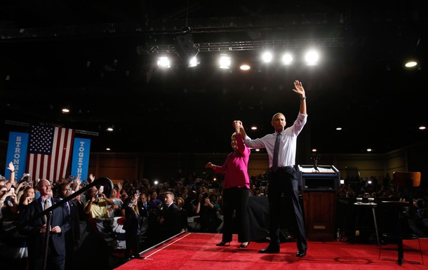 U.S. President Obama waves with Democratic U.S. presidential candidate Clinton at campaign event in 