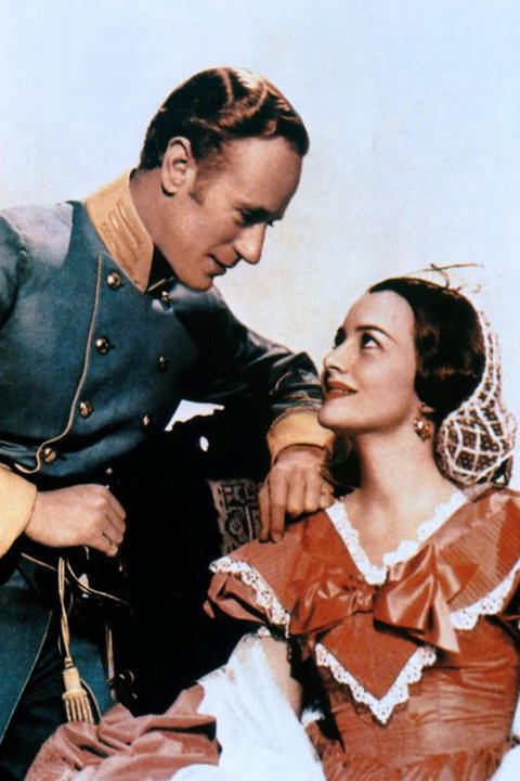 Olivia de Havilland jako Melanie Hamilton Wilkes w filmie "Przeminęło z wiatrem" (1939). Na zdjęciu także Leslie Howard