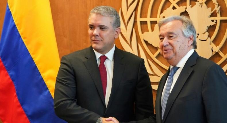 President Ivan Duque of Colombia (L) is greeted by United Nations Secretary-General Antonio Guterres on September 24, 2018 at UN headquaters in New York