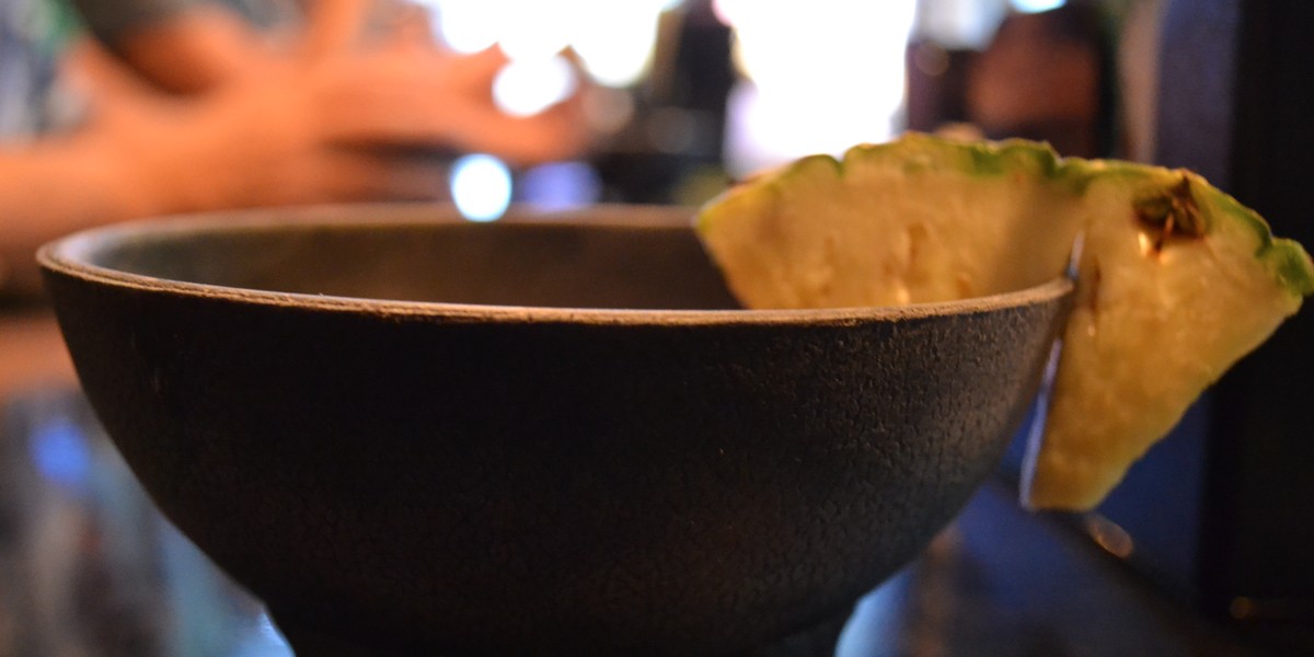 My bowl of kava was served with a wedge of pineapple.