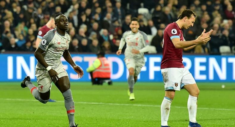 Missed opportunity: Sadio Mane (left) opened the scoring in Liverpool's 1-1 draw at West Ham