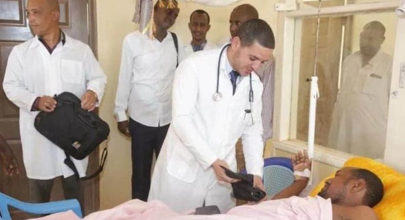 One of the Cuban doctors assigned to Mandera County Dr Landy Rodriguez attends to a patient after performing a past operation 