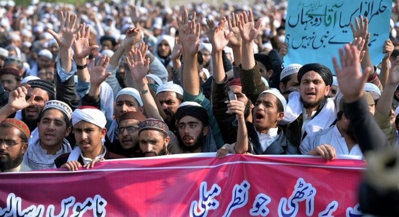 Religious students and activists gather for a protest against social media in Islamabad on March 8, 2017, demanding the removal of all blasphemous content from social media sites in the country