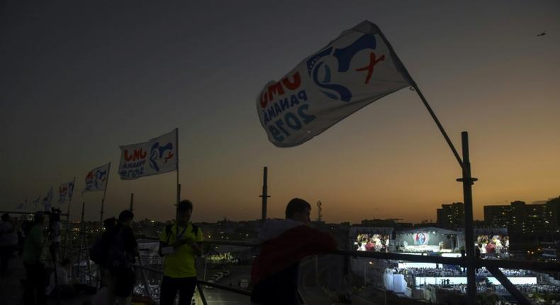 Catholics participate in the opening mass of World Youth Day in Panama City on the eve of the arrival of Pope Francis