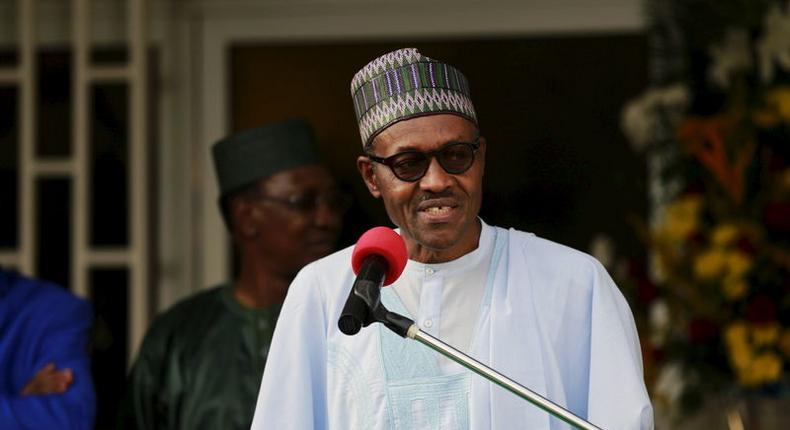 Nigeria's President Muhammadu Buhari speaks during a news conference after the Summit of Heads of State and Government of The Lake Chad Basin Commission (LCBC) in Abuja, Nigeria, June 11, 2015.   REUTERS/Afolabi Sotunde