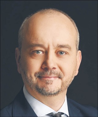 Łukasz Szatkowski menedżer w zespole nieruchomości MDDP