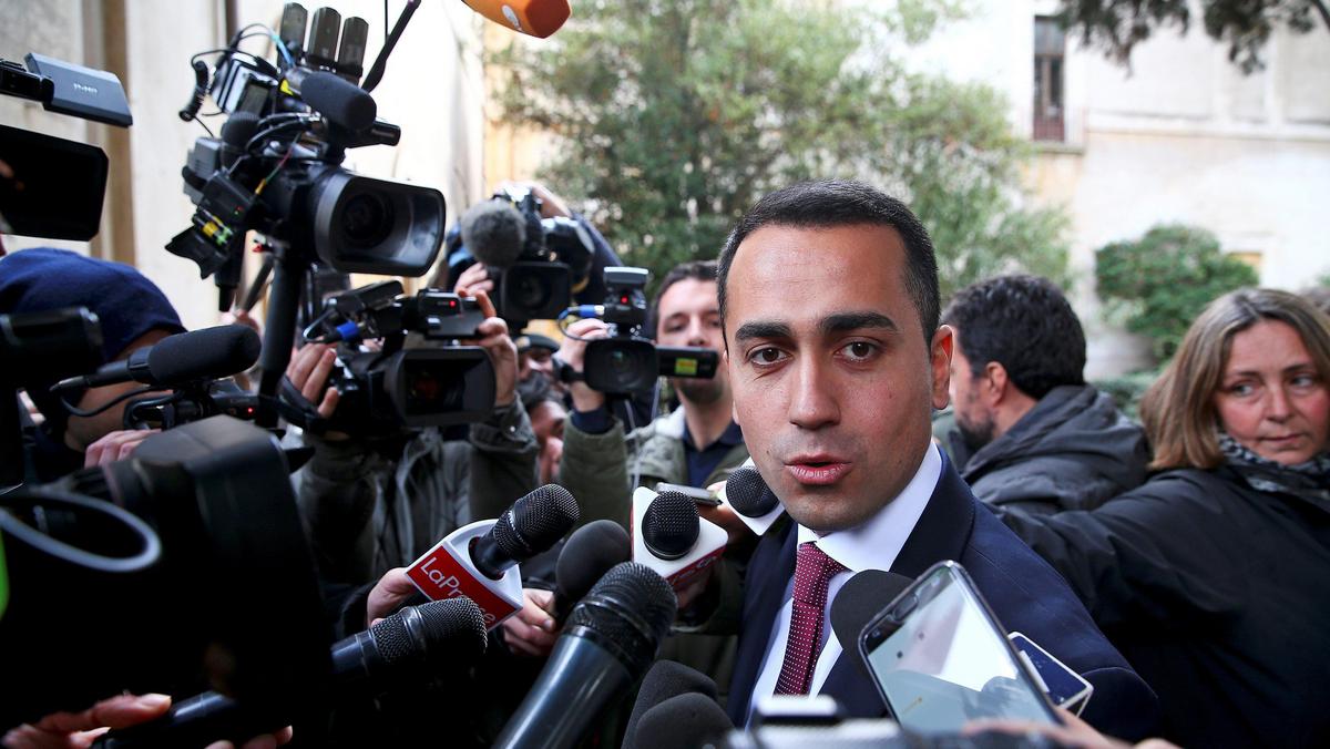 5-Star Movement leader Luigi Di Maio speaks to journalists as he arrives at the Link Campus Universi