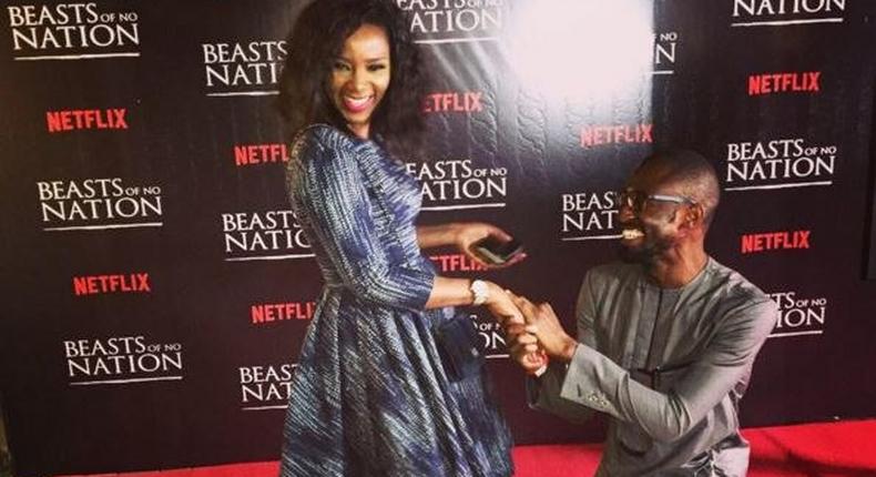 Uzodinma Iweala proposing to Genevieve Nnaji. 