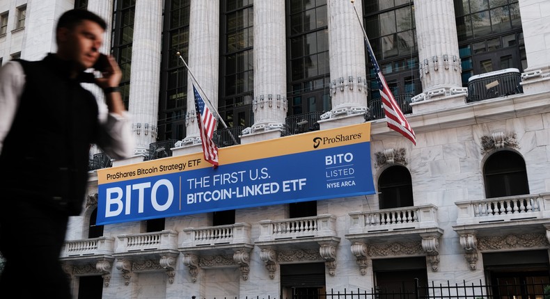 A banner for the newly listed ProShares Bitcoin Strategy ETF hangs outside the New York Stock Exchange.
