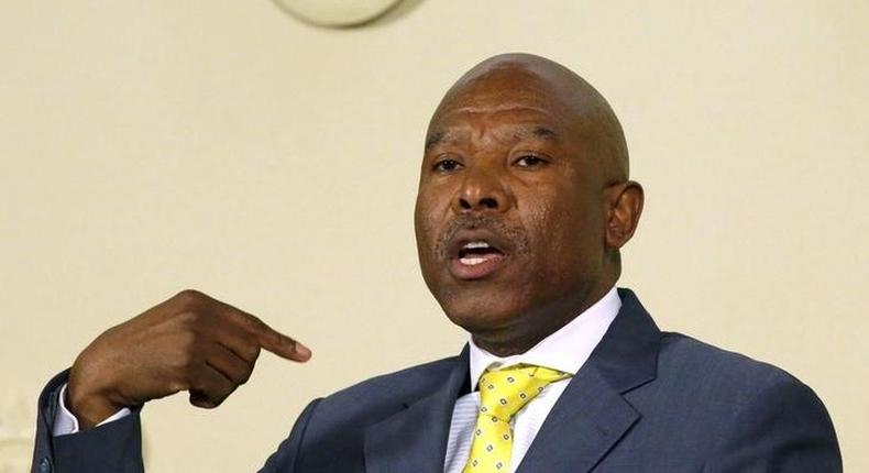 South African Reserve Bank governor (SARB) Lesetja Kganyago gestures during a media briefing in Pretoria, October 6, 2014.    REUTERS/Siphiwe Sibeko