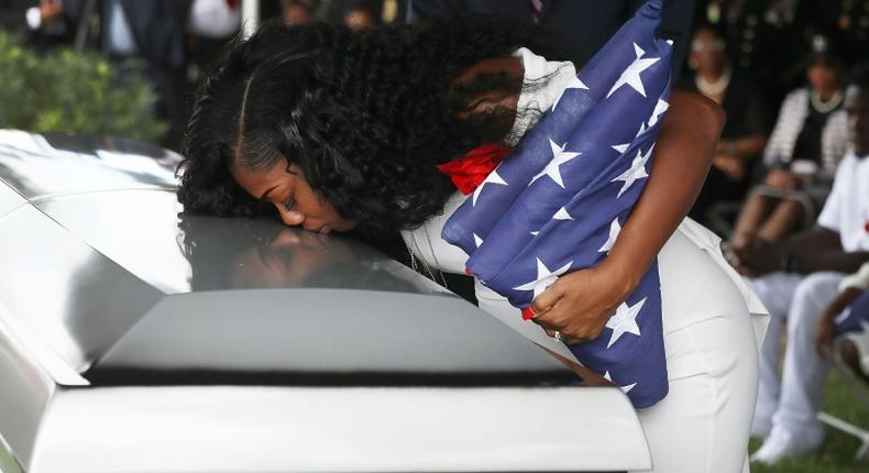 Myeshia Johnson kisses the casket of her husband US Army Sgt. LaDavid Johnson, who was killed in the October 4, 2017 ambush in Niger