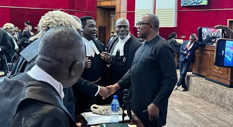 Peter Obi saying hello to his legal team