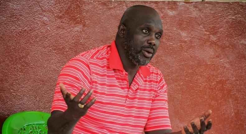 Former international Liberian soccer star turned politician, George Weah speaks during an interview in Monrovia on July 7, 2017