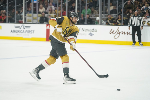 Feb 25, 2023; Las Vegas, Nevada, USA; Vegas Golden Knights defenseman Shea Theodore (27) passes the puck during the first period against the Dallas Stars at T-Mobile Arena. Mandatory Credit: Lucas Peltier-USA TODAY Sports/Sipa USA HOKEJ NA LODZIE LIGA NHL FOT. SIPAUSA/NEWSPIX.PL POLAND ONLY !!! --- Newspix.pl *** Local Caption *** www.newspix.pl mail us: info@newspix.pl call us: 0048 022 23 22 222 --- Polish Picture Agency by Ringier Axel Springer Poland