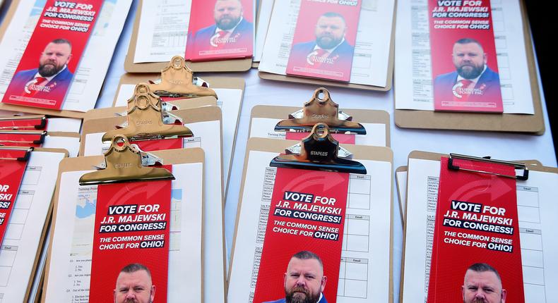 Campaign fliers for Republican congressional candidate J.R. Majewski are seen at the the Get out the Vote Super Saturday rally in Port Clinton, Ohio, on July 30, 2022.