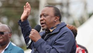 President Uhuru Kenyatta addresses a roadside gathering on August 6, 2022 after a one-day working tour of the Central region where he inspected and commissioned several development projects in Murang'a and Nyeri counties