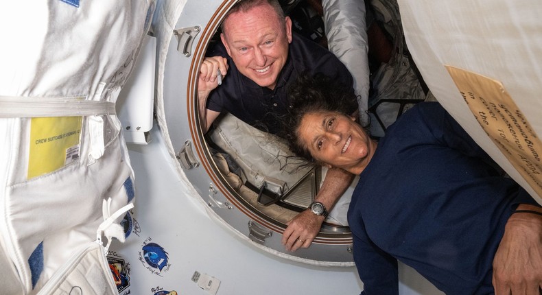 Wilmore and Williams inside the vestibule between the space station and Boeing's Starliner spacecraft.NASA