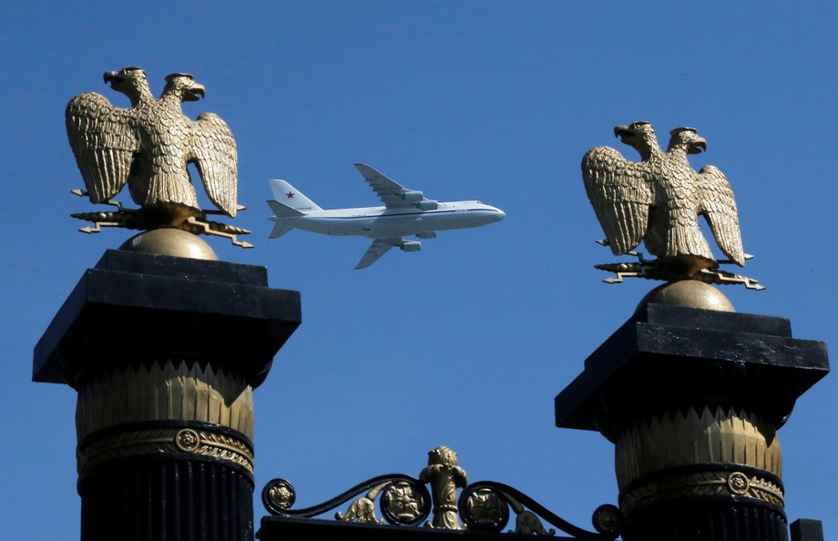 Russian An-124-100 Ruslan strategic heavy transport aircraft flies during the Victory Day parade, marking the 71st anniversary of the victory over Nazi Germany in World War Two, above two-headed eagle statues at Alexandrovsky Garden in Moscow, Russia, May 9, 2016.