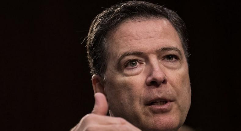 Former FBI Director James Comey testifies on Capitol Hill.