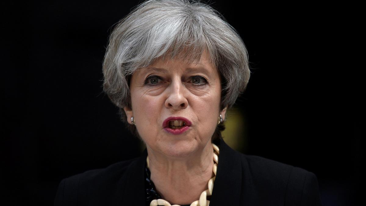 Britain's Prime Minister Theresa May speaks outside 10 Downing Street after an attack on London Bridge and Borough Market left 7 people dead and dozens injured in London