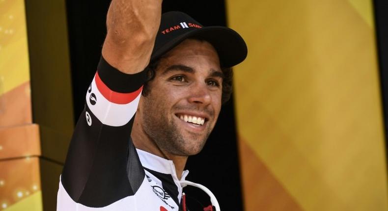 Stage winner Michael Matthews celebrates on the podium after winning the 165 km sixteenth stage of the Tour de France on July 18, 2017 between Le Puy-en-Velay and Romans-sur-Isere