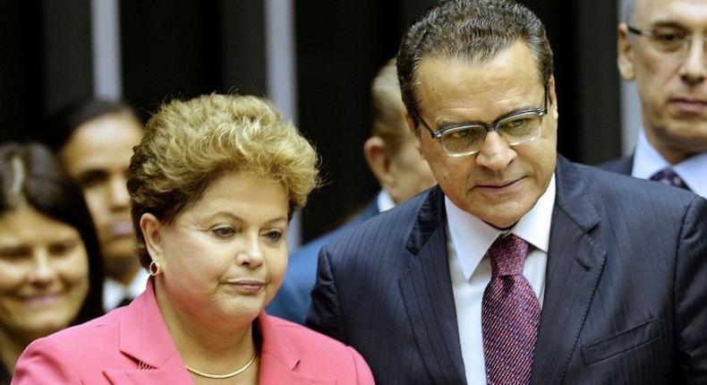 Brazilian former tourism minister Henrique Eduardo Alves (R) is seen with former President Dilma Rousseff in 2013