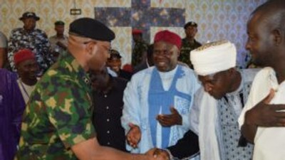 Maj.-Gen. Abdusalam Abubakar, the Commander of OPSH with some stakeholders during a security meeting in Mangu, Plateau. (Credit: NAN)