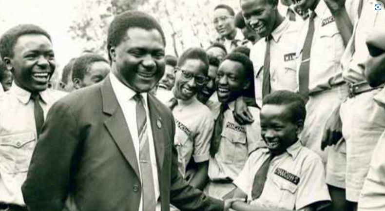 Tom Mboya (in suit) with students