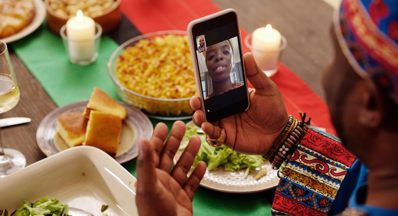 Photo of people talking to each other through smartphones during the holidays (Photo: Askar Abayev)