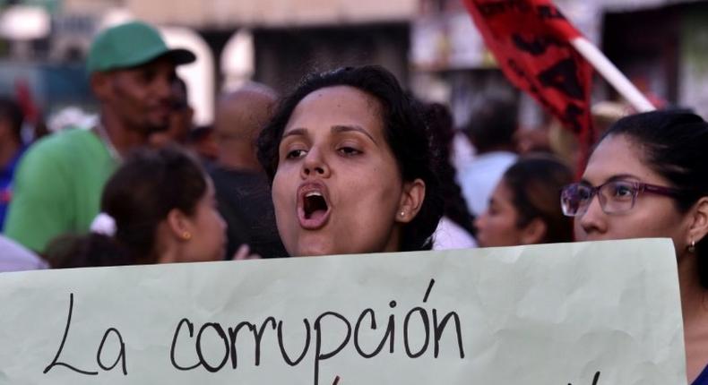 Workers, student and farmers protest against corruption in connection with the scandal involving Brazilian construction giant Odebrecht, in front of Panama's Congress in Panama City on February 16, 2017