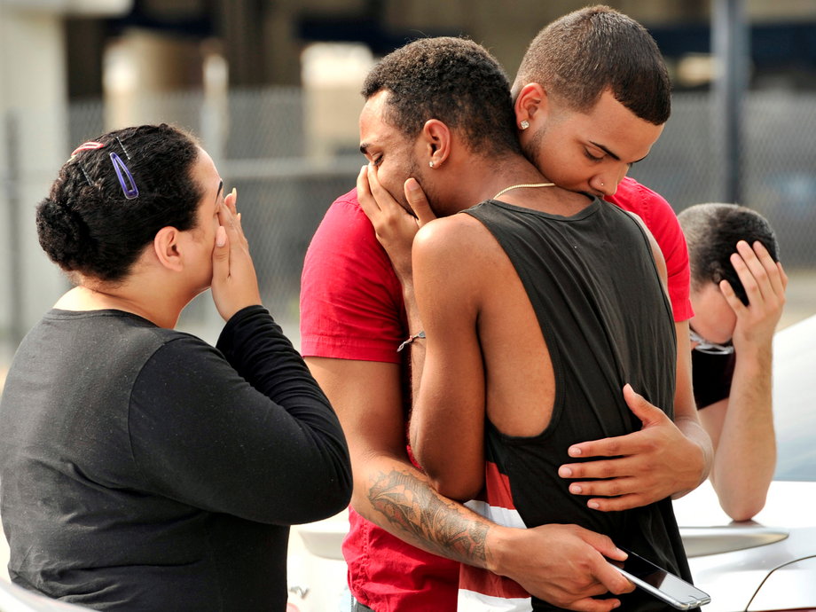 Friends and family members outside the Orlando Police Headquarters during the investigation of a shooting at the Pulse nightclub.