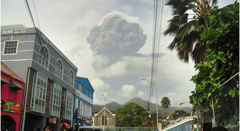 Citizens watching ash plumes from La Soufrire.
