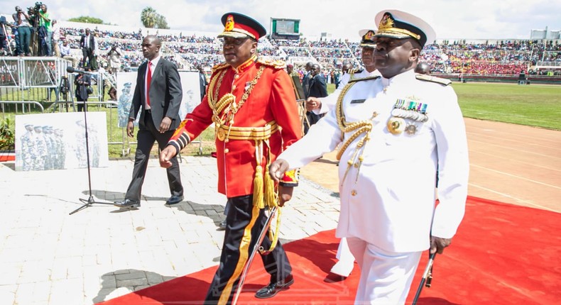 President Uhuru Kenyatta in the red military tunic