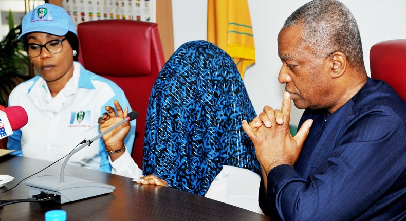 Minister of Foreign Affairs, Geoffrey Onyeama (R); Director General, National Agency for the Prohibition of Trafficking in Persons (NAPTIP), Dame Julie Okah-Donli (L), and a victim of trafficking, during a news conference on Human trafficking in Abuja.