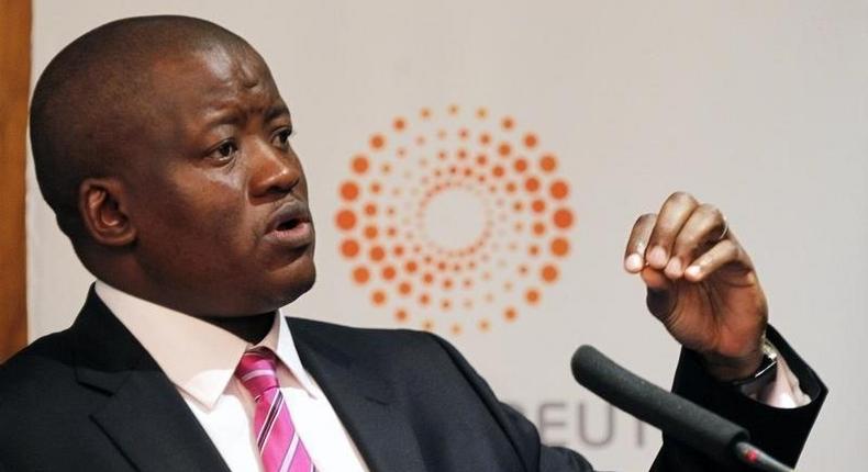 South African Treasury Director-General Lungisa Fuzile gestures as he addresses the Reuters Economist of the Year Award ceremony in Johannesburg April 13, 2012. REUTERS/Mike Hutchings