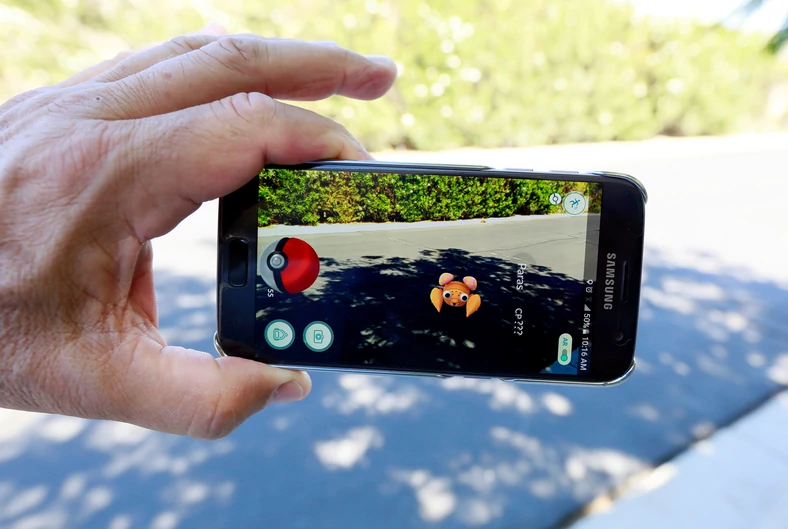 Illustration of the augmented reality mobile game "Pokemon Go"